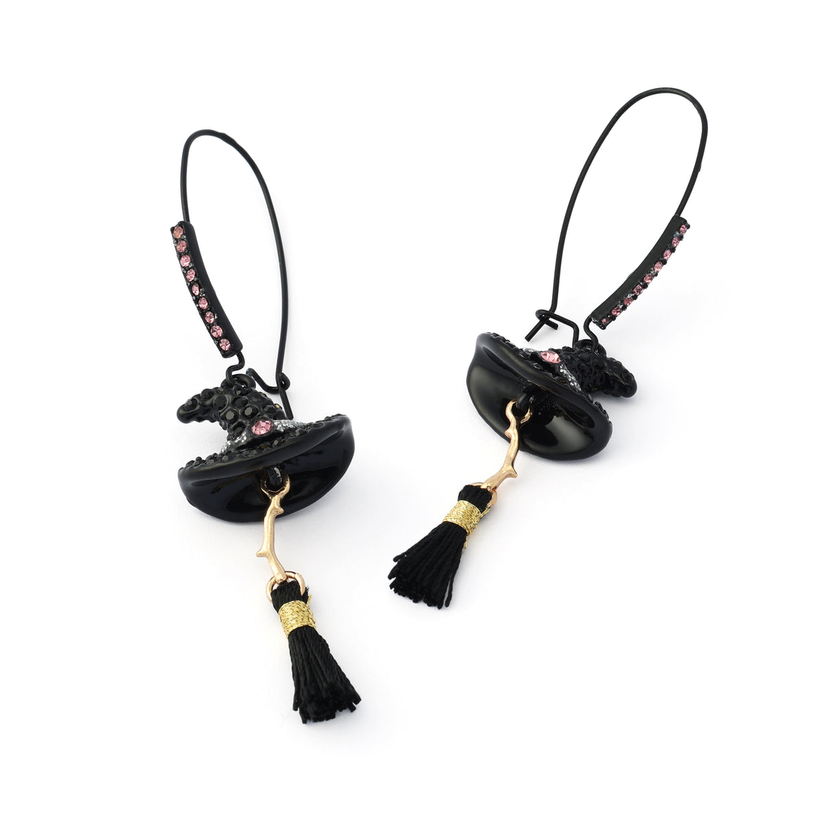 A pair of gothic-style black witch hat dangle earrings with gold-tone accents, small pink rhinestones, and black tassels, shown on a plain white background.