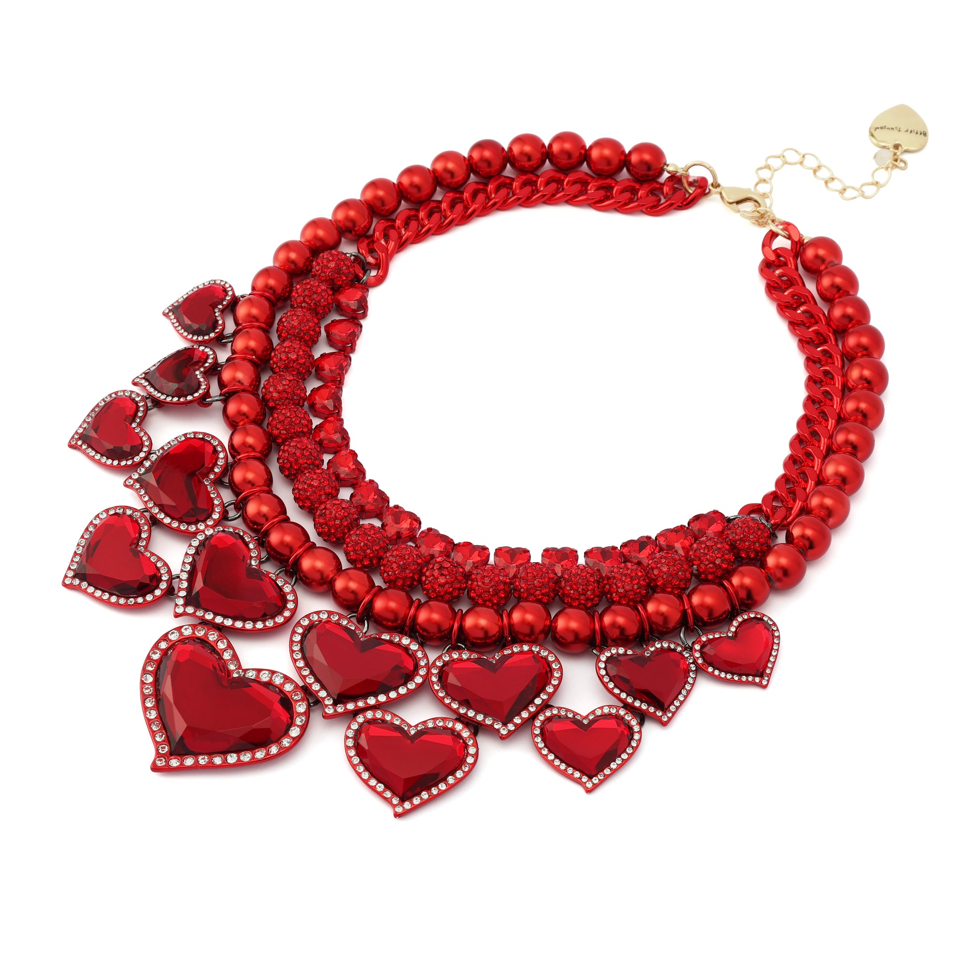 Red heart-shaped necklace on a white background
