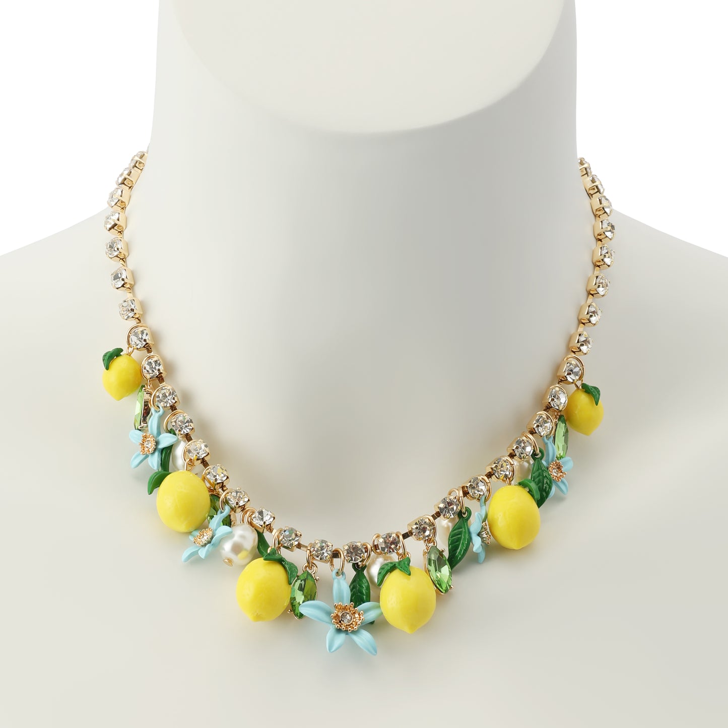 Necklace with lemon and flower decorations on a mannequin