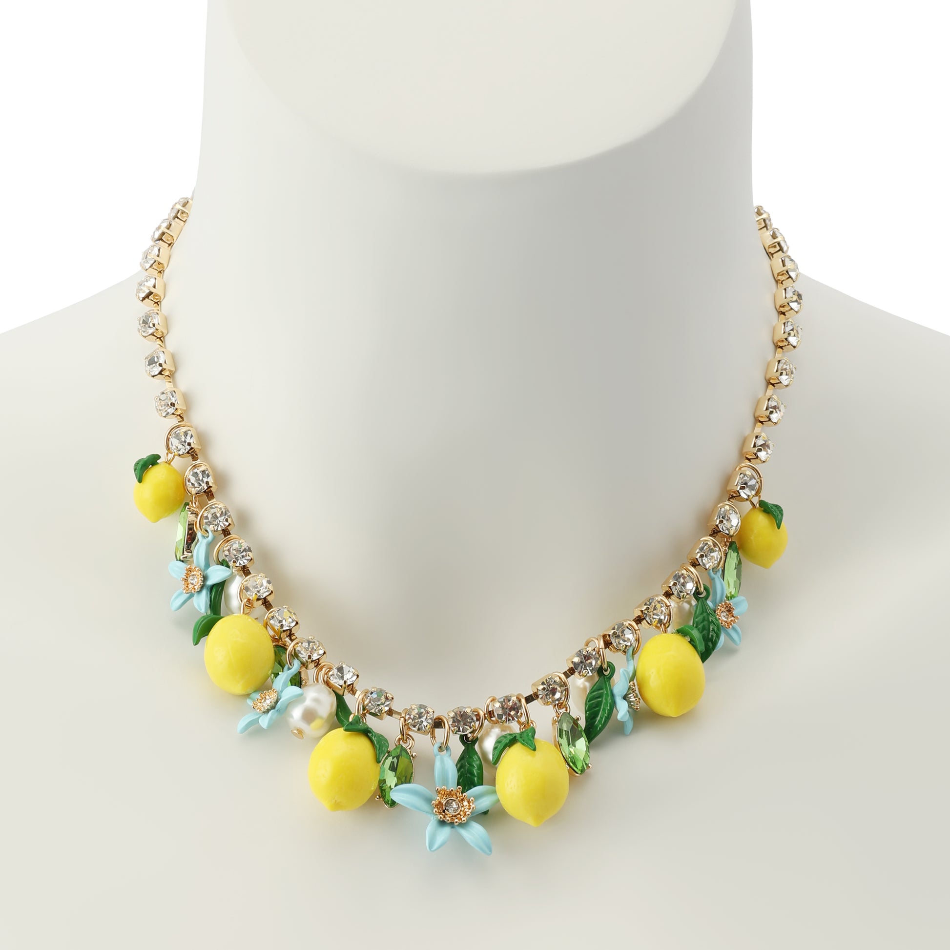 Necklace with lemon and flower decorations on a mannequin