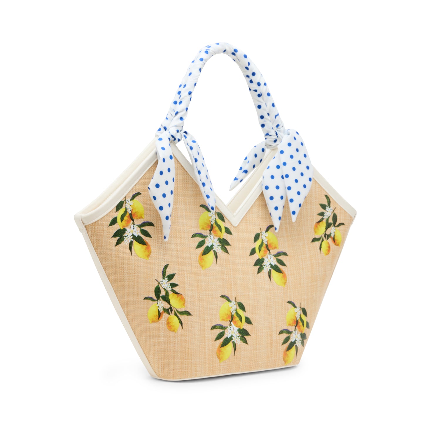 Woven bag with lemon pattern and blue polka dot handles on a white background
