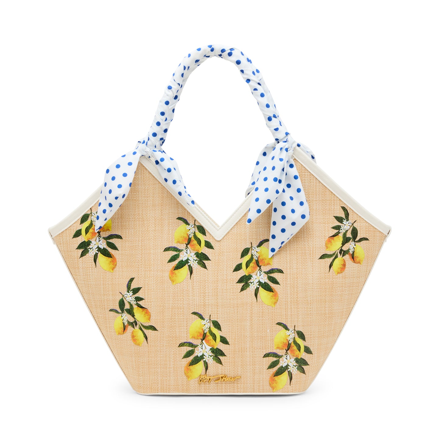 Woven handbag with lemon pattern and polka dot handle on a white background