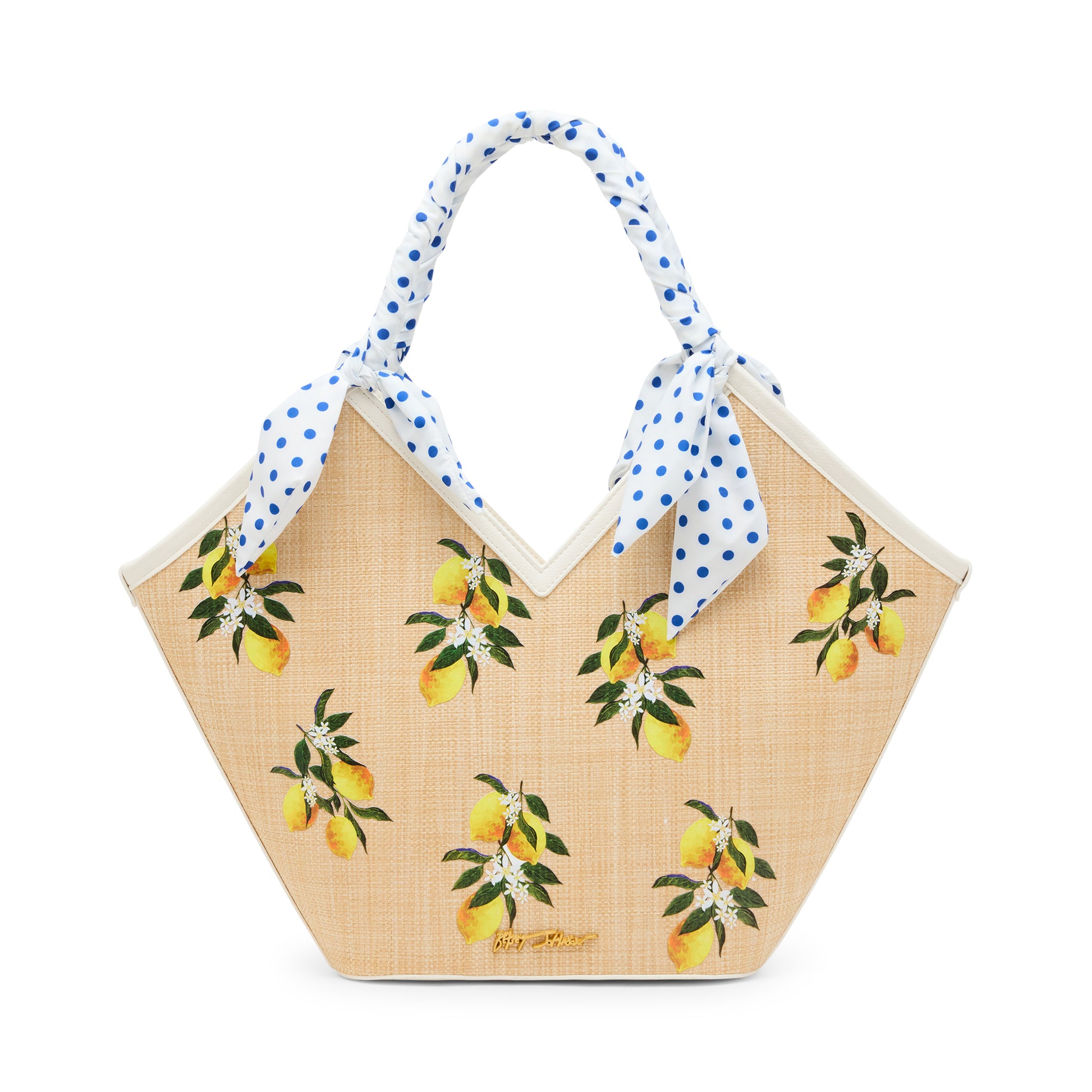 Woven handbag with lemon pattern and polka dot handle on a white background