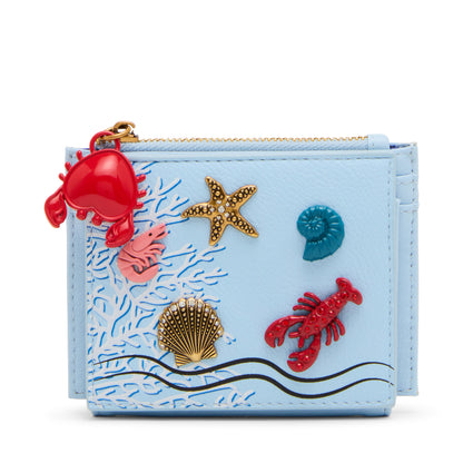 Light blue pouch with ocean-themed decorations including red lobsters, a starfish, and shells on a white background.