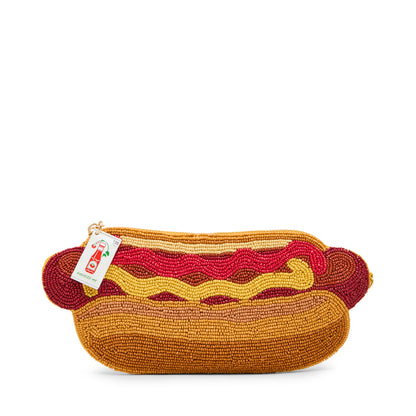 Hot dog-shaped beaded purse with a ketchup label on a white background