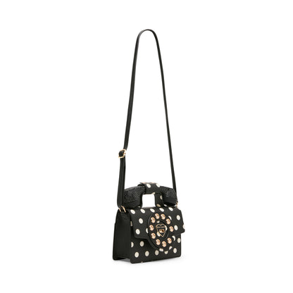 Black handbag with white polka dots and gold accents on a white background