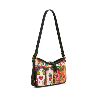 Colorful handbag with face designs on a white background