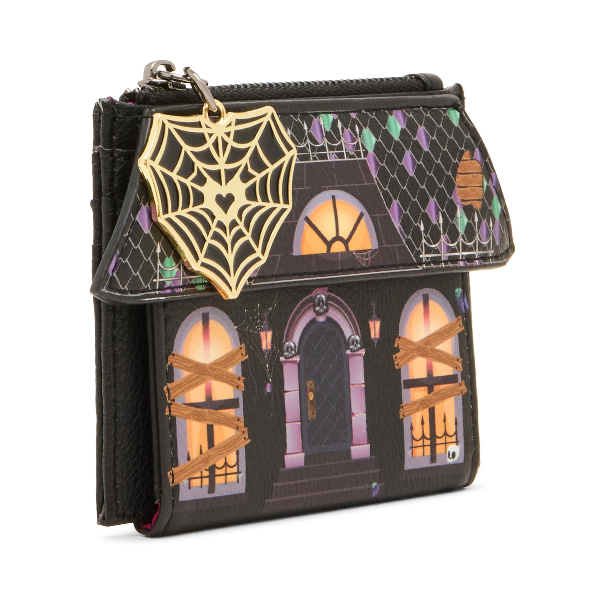 A small black zip wallet with a Halloween house design on the front flap and body, featuring purple arched windows, orange glowing light details, cobweb graphics, and a dangling gold spiderweb charm.