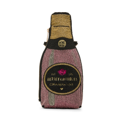 Bottle-shaped pouch with 'Betsey Bubbles Champagne' design on a white background