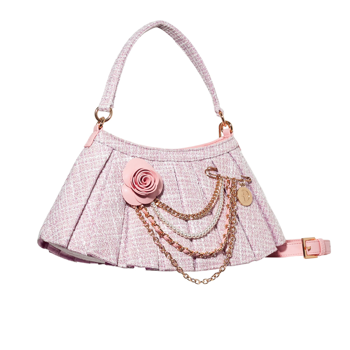 A light pink tweed shoulder bag with a pleated design, featuring a pink fabric rose embellishment, layered gold and silver chains, and a matching pink shoulder strap on a white background.