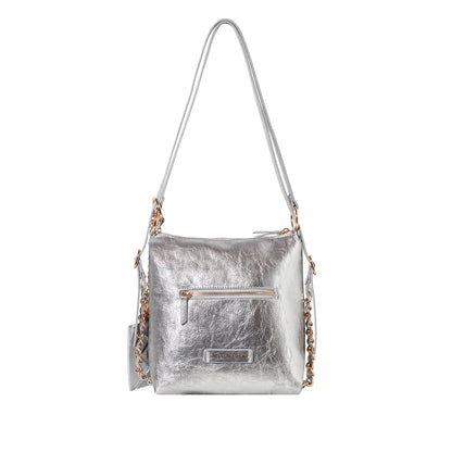 A metallic silver shoulder bag with a textured finish, featuring a front zippered pocket, a silver shoulder strap, and a gold-tone chain detail on the sides, shown against a plain white background.