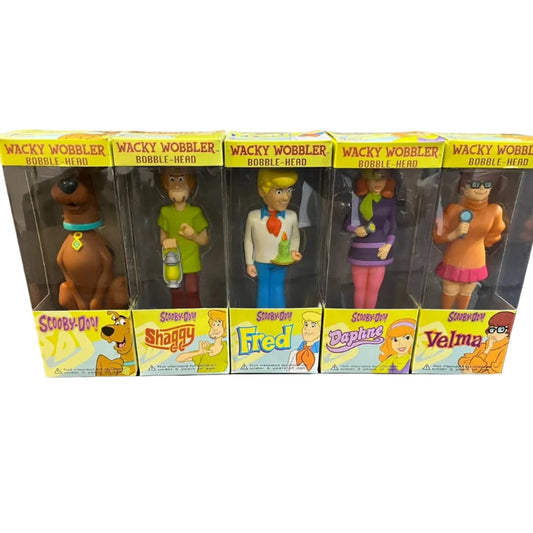 Set of Wacky Wobbler bobble-head figures in packaging with Scooby-Doo characters.