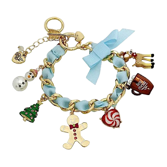 Bracelet with various charms including a gingerbread man, candy cane, and snowman on a light blue ribbon.